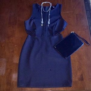 Black cocktail dress with sheer cutouts